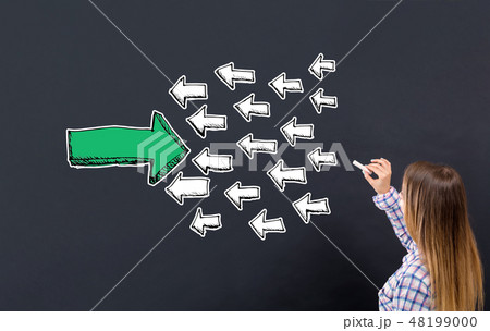 Arrow facing in a opposite direction with young woman Arrow facing in a opposite direction with young woman 48199000