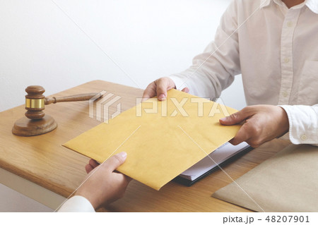 Lawyer send a contract documents to client. Lawyer send a contract documents to client. 48207901