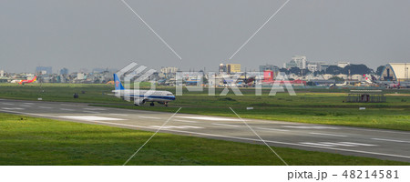 Passenger airplane taxiing on runway Passenger airplane taxiing on runway 48214581