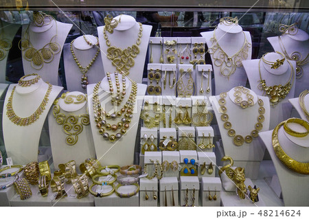 Gold jewelry in the display window Gold jewelry in the display window 48214624