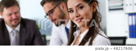 Beautiful smiling brunette clerk girl at workplace 48217606