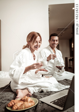 Girlfriend and boyfriend enjoying French breakfast in hotel 48218213