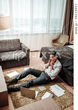 Young businessman feeling concerned about new business plan 48219957