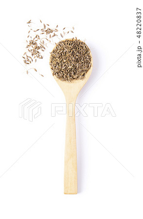Cumin seeds on white background Cumin seeds on white background 48220837
