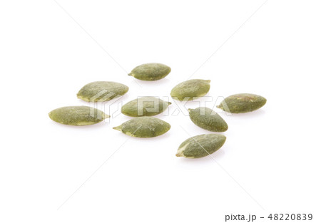 Raw pumpkin seeds on white background Raw pumpkin seeds on white background 48220839
