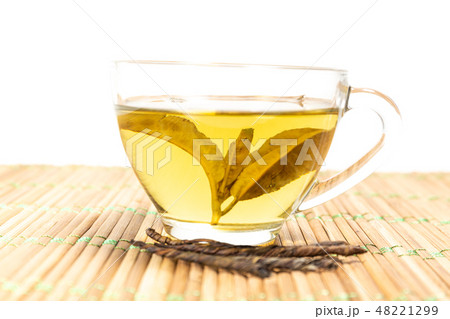 Green tea in a cup 48221299