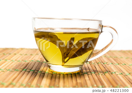 Green tea in a cup Green tea in a cup 48221300