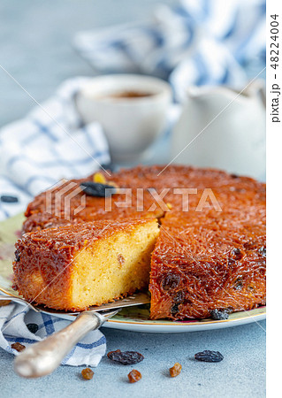Dish with traditional dessert of baked noodles. Dish with traditional dessert of baked noodles. 48224004