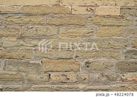 The image of old limestone brick wall closeup. 48224078