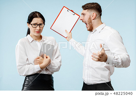 angry businessman and his colleague in the office. angry businessman and his colleague in the office. 48225040