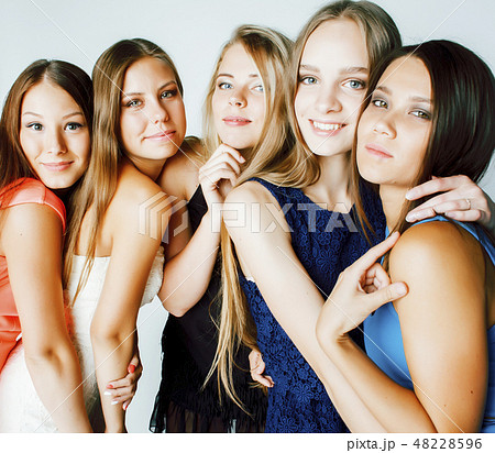 many girlfriends hugging celebration on white background, smiling talking chat, girl next door close many girlfriends hugging celebration on white background, smiling talking chat, girl next door close 48228596