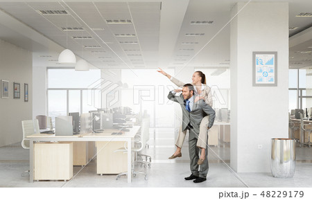 Business people having break in office Business people having break in office 48229179