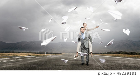 Business people having break in office Business people having break in office 48229181