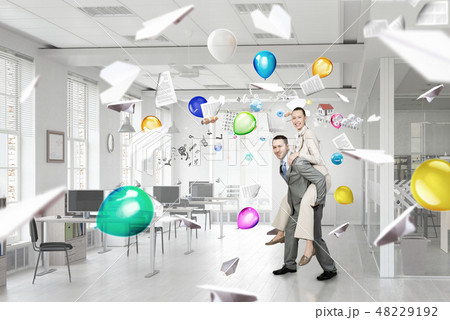 Business people having break in office Business people having break in office 48229192