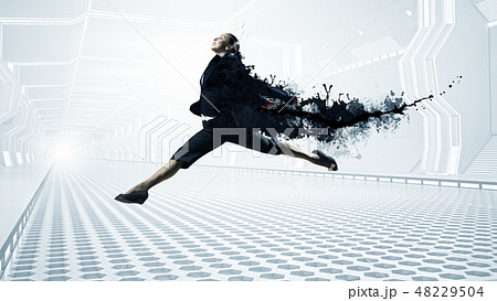 Dancing businesswoman in office 48229504