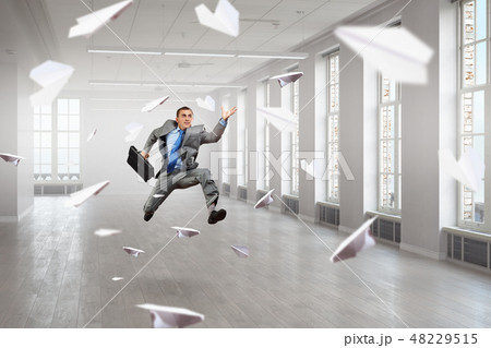 Dancing businessman in office 48229515