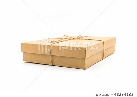 Brown paper box, tied with string. Brown paper box, tied with string. 48234132