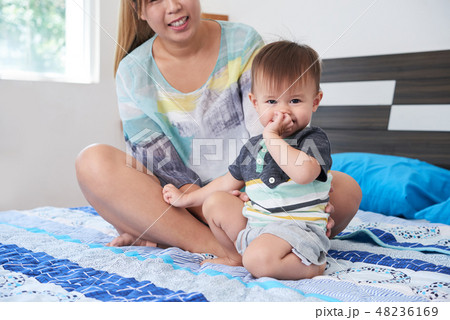 Shy little boy 48236169