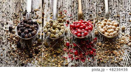 Peppers on wooden board 48236436