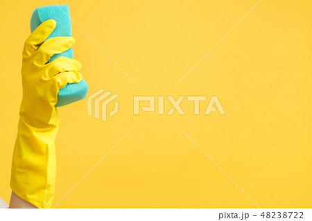 cleaning advertising hand glove sponge copy space 48238722