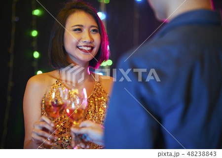 Joyful woman at party Joyful woman at party 48238843