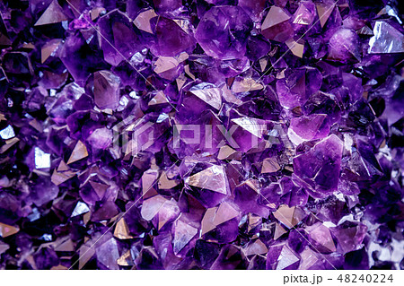 Amethyst purple crystal. Mineral crystals in the natural environment. Texture of precious and 48240224
