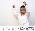 very happy asian boy making thumbs up sign 48240773