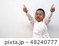 very happy asian boy making thumbs up sign 48240777
