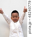 very happy asian boy making thumbs up sign 48240779