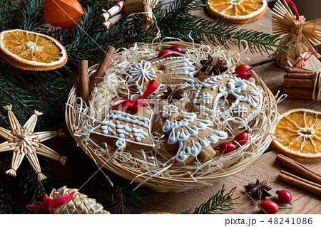 Christmas gingerbread cookies in a wicker basket Christmas gingerbread cookies in a wicker basket 48241086