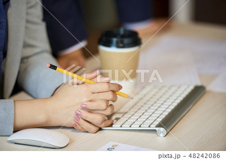 Hands of businesswoman Hands of businesswoman 48242086