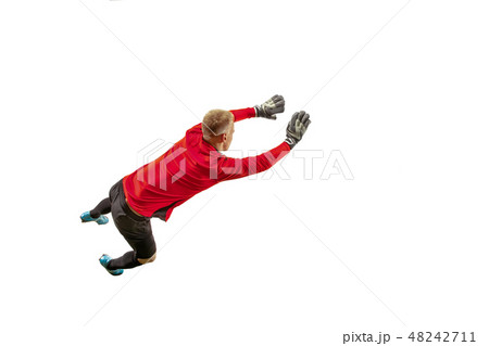 One soccer player goalkeeper man catching ball One soccer player goalkeeper man catching ball 48242711