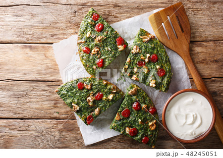 Delicious healthy omelette from herbs Delicious healthy omelette from herbs 48245051