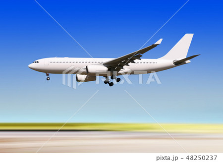 plane landing over runway of airport plane landing over runway of airport 48250237