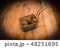 Meatballs on steel food basket 48251695