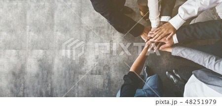 Business people putting their hands together, top view 48251979