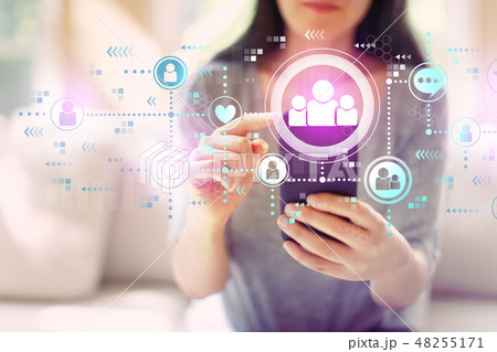 Social media with woman using a smartphone 48255171