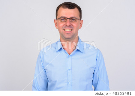 Face of happy businessman with eyeglasses smiling Face of happy businessman with eyeglasses smiling 48255491