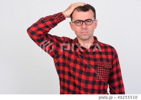 Portrait of stressed hipster man getting bad news Portrait of stressed hipster man getting bad news 48255510
