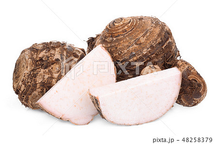 whole and slices raw taro root isolated on white  48258379