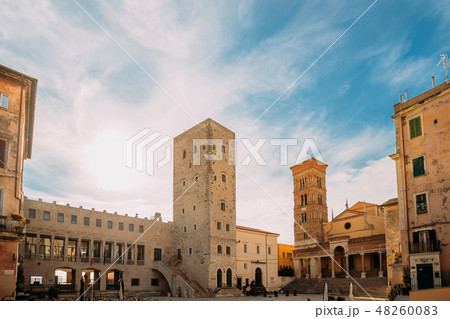 Terracina, Italy. Tower Of Cathedral Of San Cesareo And Town Hall In Sunny Day Terracina, Italy. Tower Of Cathedral Of San Cesareo And Town Hall In Sunny Day 48260083