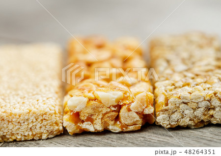 Assorted kozinaki, on the old vintage background. 48264351