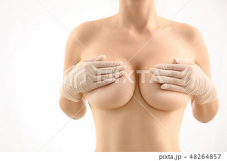 Close-up On Hand Holding Big Boobs Stock Photo 674709550