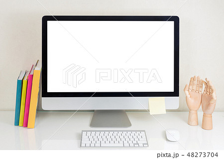 Workplace with computer monitor with blank screen on desk 48273704