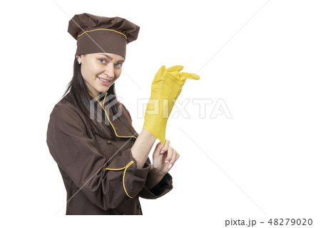 Chef wears rubber glove Chef wears rubber glove 48279020