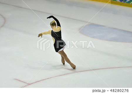 Girl ice skating 48280276