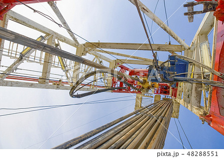 Drilling rig against the blue sky 48288551