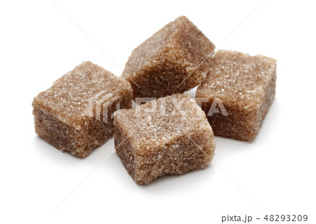 Brown sugar cubes isolated on white 48293209