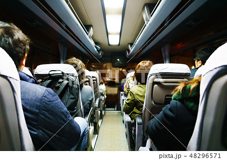 日本 夜のバスの車内の写真素材