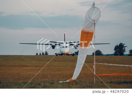parachutist aircraft on land 48297020